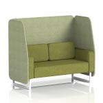 This photo captures a sleek and modern seating option - the Dynamic Booths 2 Seater Open Booth with White Legs. The Brixworth design features burnish panels and an olive sofa in rivet fabric, creating a versatile and stylish addition to any space.