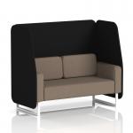 The photo features a stylish Dynamic Booths 2-seater open booth with sleek white legs. The booth is made to order with two fabric panels in a circular design. In the background, a Theory Sofa SF002170 adds to the modern aesthetic.