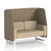 The photo shows a sleek, modern open booth with white legs in a neutral beige fabric. Bank panels add an interesting touch, while a small sofa sits next to it, completing the stylish look.