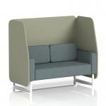 This picture features a sleek and contemporary Dynamic Booths design. The Brixworth 2 seater open booth boasts crisp white legs and is upholstered in Main Line Flax fabric. The booth is adorned with Newbury panels and complemented by a Westminster Sofa, creating a stylish and modern seating arrangement.