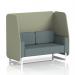 This picture features a sleek and contemporary Dynamic Booths design. The Brixworth 2 seater open booth boasts crisp white legs and is upholstered in Main Line Flax fabric. The booth is adorned with Newbury panels and complemented by a Westminster Sofa, creating a stylish and modern seating arrangement.