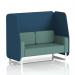 The photo shows a modern, customizable Brixworth 2 seater open booth with sleek white legs. The Sumi fabric offers a stylish touch, while the uto panels and Handa Sofa add an extra level of comfort. Perfect for any dynamic space.