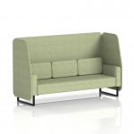 This picture features a dynamic booth made to order in Brixworth design with a 3-seater open booth and sleek black legs. The booth is upholstered in rivet fabric with burnish panels, creating a modern and stylish look. The attached sofa adds an element of comfort to the overall design.