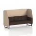The image shows a dynamic booth with a modern design, capable of seating three people comfortably. The booth has black legs and is made to order with high-quality synergy fabric. The open style and affix panels add a unique touch, while the wed sofa brings additional seating options.