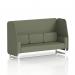 This image features a modern and versatile open booth with white legs. The main line flax fabric adds a touch of elegance, while the monument panels and sofa create a dynamic and unique design. Perfect for any upscale event or lounge setting.