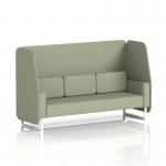 This photo features a dynamic booth with white legs and a 3-seater open design. The booth is made to order in Brixworth and is upholstered in Main Line Flax fabric. The Newbury panels and sofa add a stylish touch.