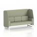 This photo features a dynamic booth with white legs and a 3-seater open design. The booth is made to order in Brixworth and is upholstered in Main Line Flax fabric. The Newbury panels and sofa add a stylish touch.