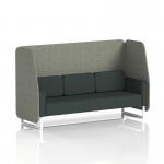 This photograph features a modern and stylish open booth from Dynamic Booths. The booth is customizable and made to order with three seats and white legs. Its rivet fabric and vitreous panels add a touch of elegance. The charcoal sofa adds a chic contrast to the overall design.