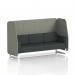 This photograph features a modern and stylish open booth from Dynamic Booths. The booth is customizable and made to order with three seats and white legs. Its rivet fabric and vitreous panels add a touch of elegance. The charcoal sofa adds a chic contrast to the overall design.