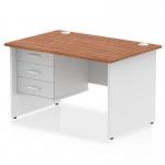 This photograph features a sleek and modern Dynamic Pedestal Desk with a 1200 x 800mm walnut top and white panel end leg. It comes with a 3 drawer fixed pedestal for storage and a smooth straight design. The combination of wood and white creates a sophisticated look.