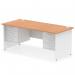 This photo features a dynamic pedestal desk, specifically the Impulse 1800 x 800mm straight office desk. The desk has an oak top and a white panel end leg, as well as 2 x 3 drawer fixed pedestal TT000205. The desk is sleek and modern, with plenty of storage space and a sturdy design. It would be a great addition to any office space.