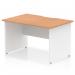 This image shows a dynamic panel end desk in the Impulse design. The desk measures 1200 x 800mm and features a scalloped edge and an oak top. The panel end leg is white in color.