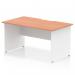 The photograph captures a modern and sleek office desk with scalloped edges and a beech top, contrasted by white panel end legs. The dynamic panels add interest and functionality to the 1400 x 800mm space. Clean lines and a professional finish make this desk a stylish addition to any workplace.