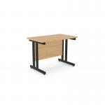 The image displays a modern and sleek office space, featuring rectangular beech desks with metal legs. The desks are 1000mm x 600mm and have a straight design. The black accents add a touch of sophistication.