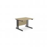 This photo features a sleek, modern office space with two rectangular desks made of ashford twin bar metal legs measuring 1000mm x 800mm. The desks are finished in urban oak and contrasted with black accents.