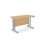 The image shows a sleek, modern office setup with two rectangular desks made of ashford twin bar metal legs. The desks measure 1200mm x 600mm and are a straight design. The desks have a beech finish and are accompanied by a SLV ATW-CTST1260/BE/SLV.