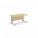 This photo features two rectangular desks with sleek metal legs in an office setting. The desks have a modern design and are finished in a light maple color. The workspace measures 1400mm x 800mm and is clean and organized, perfect for any professional setting.