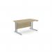 The image shows a modern office with rectangular desks made of urban oak, featuring twin bar metal legs. The desks measure 1400mm x 800mm and are in a straight design. The space is well-organized and ideal for a productive work environment.