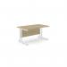 This photo shows two urban oak rectangle desks in an edit office. Each desk has a sleek metal leg and measures 1400mm by 800mm. The desks have a clean straight design.
