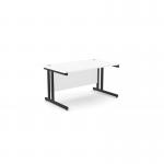 The photograph shows a modern office space with two rectangular white desks, each measuring 1400mm x 800mm. The desks have sleek black metal legs and are set up in a straight configuration. The clean and professional look of these desks would fit perfectly in any modern workspace.