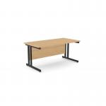 The photo shows a sleek and professional office space with two rectangular desks made of beech wood and supported by sturdy metal legs. The desks measure 1600mm x 800mm and are perfect for any modern workplace. The clean lines and simple design add a touch of elegance to the room.
