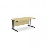 The image features a sleek and modern office space with two rectangular ashford desks. The desks have metal legs and a maple finish, giving them a clean and professional look. The desks are positioned in a straight line and measure 1600mm x 800mm. The overall aesthetic is minimalist and professional.