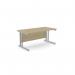 This image features a spacious urban oak rectangular desk, measuring 1600mm x 800mm, with sleek silver metal legs and a clean, modern design. Perfect for any office or workspace in need of a professional and functional update.