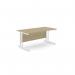 This photo features a modern office space with sleek, rectangular desks. The desks are made with Urban Oak wood and supported by clean-lined metal legs. The 1600mm x 800mm size provides ample workspace for productivity.