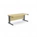 This image features a spacious office with two rectangle desks placed side by side. The desks have sleek black metal legs and a maple top. The overall look is clean and professional, perfect for a modern workplace.