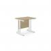 The photograph displays a clean and modern office space with sleek, rectangular desks. The desks feature a sophisticated urban oak finish and are supported by sturdy twin bar metal legs. The 800mm x 600mm size is perfect for a minimalist and functional work environment.