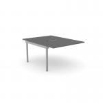 The photograph shows a modern and sleek desk set-up with add-on units, perfect for one person. The desk is graphite in color with a silver frame, and measures 1000 x 800. The clean lines and minimalist design add a professional touch to any office space.