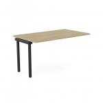 This photo features an office bench desk with add-on units in a sleek urban oak finish. The add-on portal top measures 1400 x 800 and is accented with black details. Perfect for a modern and efficient workspace for one person.