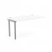 This photo shows a sleek, modern office bench desk with add-on units. The white portal top measures 1400 x 800 and is complemented by a stylish silver frame. This C-sense bench desk can comfortably seat one person.