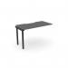 A modern and sleek office bench desk add-on unit with a scallop top, measuring 1200 x 600. The graphite finish adds a touch of elegance, while the compact size is ideal for one person.