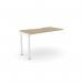 A sleek, modern office setup with wooden desk add-on units, scallop top design and a clean white finish. The desk comfortably accommodates one person and provides ample space for work and organization. The urban oak finish adds a touch of warmth to the workspace.
