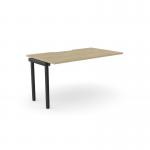 This photo captures an office bench desk with add-on units, featuring a scallop top in urban oak with a black finish. The sleek design and spacious 1400 x 800 size make it a functional and modern addition to any workspace.