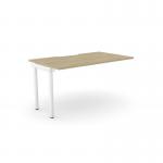 This photo shows a sleek and modern office bench desk with add-on units. The desk features a scalloped top and measures 1400 x 800mm. The color is Urban Oak with white accents, creating a stylish and professional workspace.