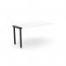 The photo shows a sleek, modern office bench desk with add-on units. The desk has a scalloped top and is 1400 x 800 in size. It is white and black in color, adding a stylish touch to any workspace.