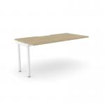 This image features a modern office desk with a sleek C-shaped design. The scallop top adds a touch of elegance while the urban oak and white color scheme adds a contemporary feel. This 1-person add-on unit seamlessly integrates with the existing desk to provide extra space for work or storage.