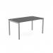 In the picture, we see a sleek and modern office bench desking set-up for one person. The top is a warm graphite color, complemented by sleek silver legs. The open design allows for a spacious and organized workspace.