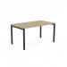 The photo shows a sleek urban oak bench desk with open legs and a portal top, measuring 1400 x 800. The top is a natural wood color and the legs are black. Clean and modern, this desk is perfect for any office space.
