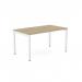 This picture shows a modern and sleek office desk with a white open leg base and an urban oak top. It has a clean and minimalist design, perfect for a single person to work comfortably.