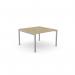 This photo showcases a sleek and modern C-sense 1 person bench with an open leg design. The scallop top adds a touch of elegance to the 1000 x 600 sized desk, finished in a stylish urban oak color with silver accents. Perfect for creating a functional and stylish workspace.
