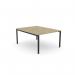 This photograph shows a sleek and modern edit office bench with an open leg design and a scallop top. Made with urban oak and a black finish, this desk measures 1200 x 800 and is suitable for one person. It is both functional and stylish, making it a great addition to any workspace.