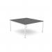 The photo shows a sleek and modern office bench desking with an open leg design and scalloped top, featuring a graphite and white color scheme. The desk measures 1400 x 800 and comfortably accommodates one person.