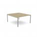 The photo shows a sleek and modern office bench with an open leg design and a scallop-shaped top. It measures 1400 x 800 and features an urban oak finish with silver accents. This 1 person bench, called C-sense, has a clean and professional look that would fit seamlessly into any office space.