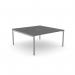 The picture shows a sleek and modern office bench with an open leg design and a scalloped top in a striking graphite color, accented with silver trim. Measuring 1600 x 800, this 1-person bench is perfect for a professional workspace.
