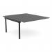 This photograph shows a modern office desk with two add-on units, featuring a sleek graphite black finish. The scallop top adds a touch of sophistication and the spacious 1400 x 800 size leaves room for two people to work comfortably.