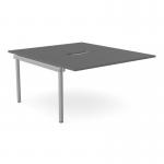 The picture shows a sleek and modern office bench desk, with add-on units that provide additional space and functionality. The desk has a scalloped top and is finished in a stylish graphite shade with silver accents. It can accommodate two persons and measures 1400 x 800.
