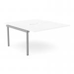 The photo shows white and silver Add-On units for a two-person C-sense bench desk, with a scalloped top measuring 1400 x 800. The modern design complements any office space.